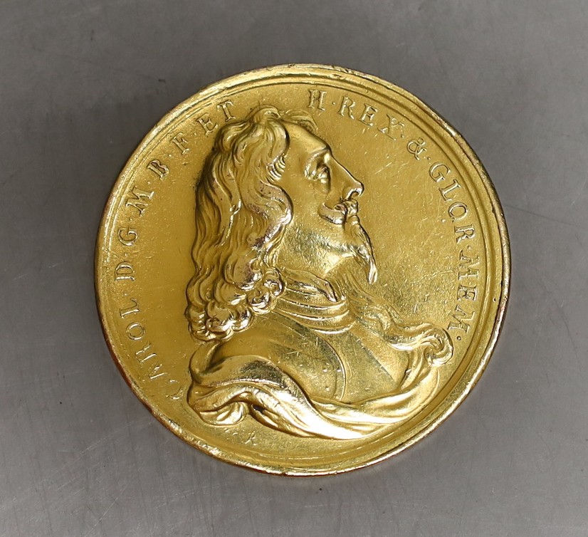 A Charles I 1649 gilt metal memorial medal by J ROETTIERS (1631-1703)